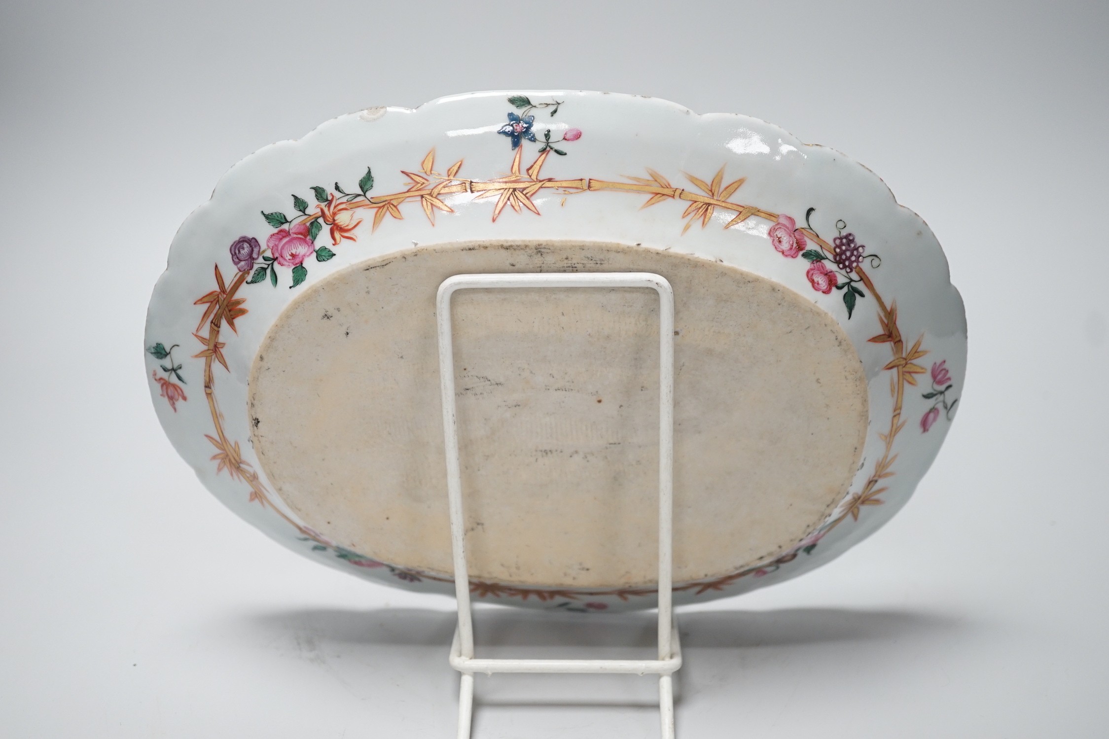 A Chinese Export pseudo armorial oval dish, c.1760, possibly of Jesuit significance, 25cms wide